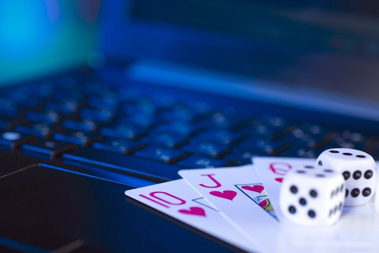 Mobile phone showing Asia Gaming baccarat table with bet buttons and live dealer feed on dewi88 login